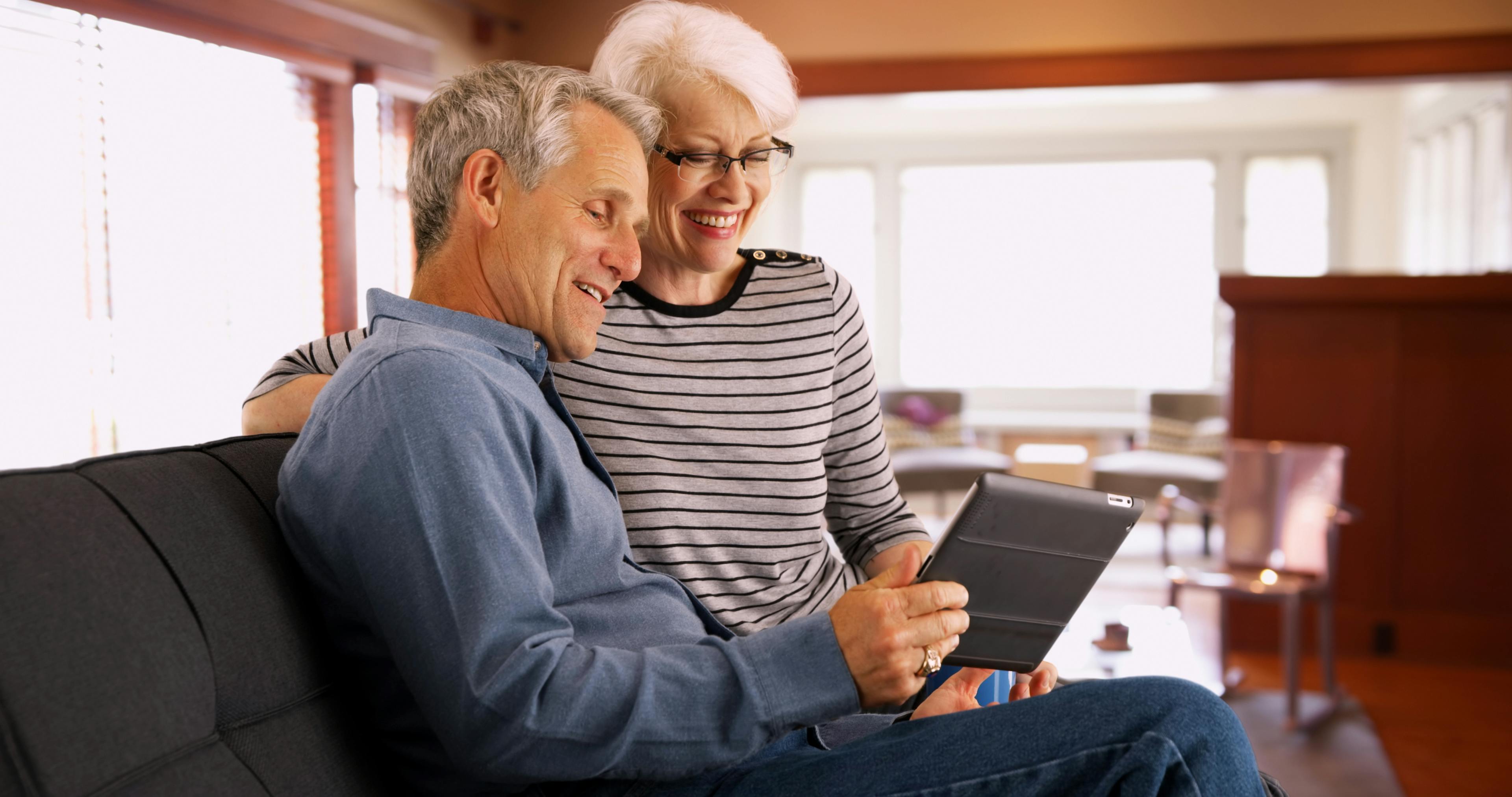 Senior Couple looking at tablet.jpeg