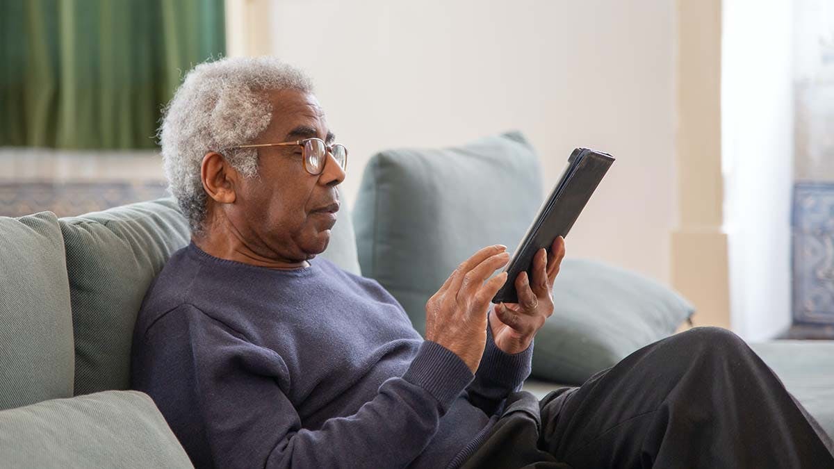 African-American Senior looking at tablet computer Medicare Colorectal Cancer Screening copy.jpg